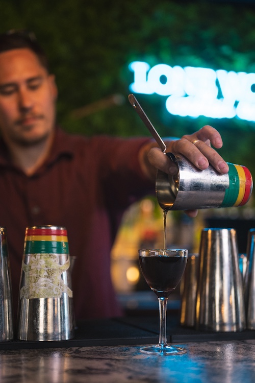 pouring a drink from Lone Wolf Bar and Restaurant in Kingston NY